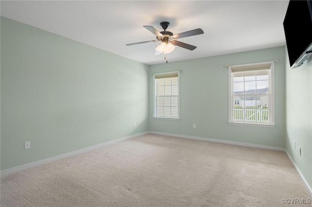 3316 Kennington Park Rd, King William, VA 23009 - unfurnished room with plenty of natural light, light colored carpet, and a ceiling fan