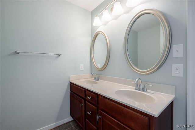 3316 Kennington Park Rd, King William, VA 23009 - bathroom with double vanity and baseboards