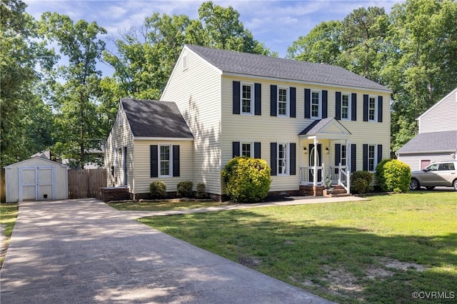 13119 Glenmeadow Ct, Midlothian, VA 23114 - colonial inspired home with a shed, a front lawn, driveway, and a shingled roof