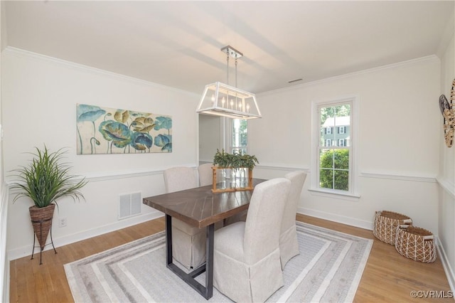 13119 Glenmeadow Ct, Midlothian, VA 23114 - dining space with wood finished floors and crown molding