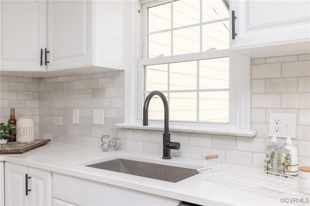 13119 Glenmeadow Ct, Midlothian, VA 23114 - kitchen with tasteful backsplash, white cabinetry, and light countertops
