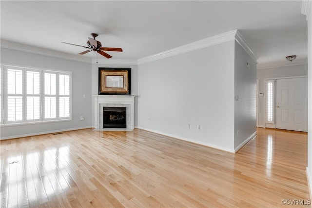 600 Krim Point Loop, Midlothian, VA 23114 - unfurnished living room with ceiling fan, ornamental molding, light wood-style floors, and a fireplace