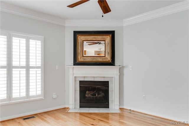 600 Krim Point Loop, Midlothian, VA 23114 - unfurnished living room featuring a ceiling fan, wood finished floors, a fireplace, and ornamental molding