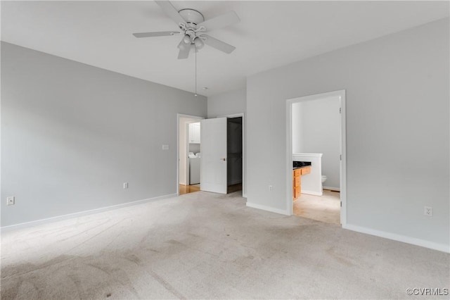600 Krim Point Loop, Midlothian, VA 23114 - unfurnished bedroom featuring light carpet, ensuite bathroom, washer / dryer, and ceiling fan