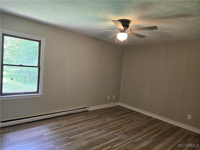 4562 Woodview Dr, Sandston, VA 23150 - empty room featuring a baseboard radiator, dark wood-style floors, plenty of natural light, a textured ceiling, and ceiling fan