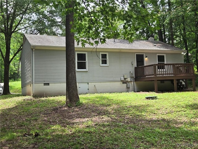 4562 Woodview Dr, Sandston, VA 23150 - rear view of house featuring a wooden deck, crawl space, a yard, and a shingled roof
