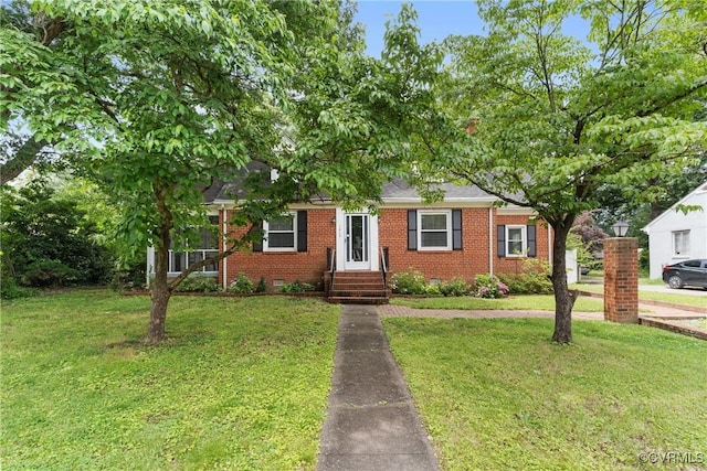 1012 Ridgecliff Dr, Richmond, VA 23224 - view of property hidden behind natural elements with brick siding and a front lawn