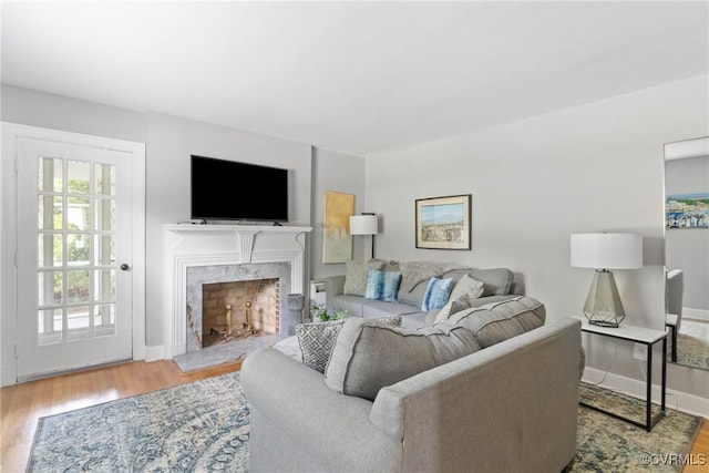 1012 Ridgecliff Dr, Richmond, VA 23224 - living area with wood finished floors and a high end fireplace
