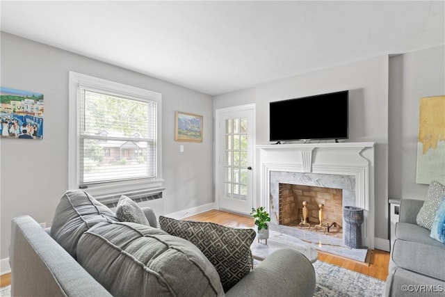 1012 Ridgecliff Dr, Richmond, VA 23224 - living area with a premium fireplace and wood finished floors