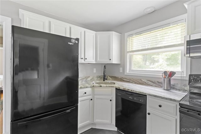 1012 Ridgecliff Dr, Richmond, VA 23224 - kitchen featuring black appliances, white cabinets, and light stone countertops