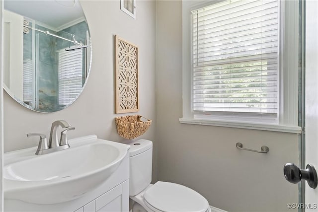 1012 Ridgecliff Dr, Richmond, VA 23224 - full bathroom with crown molding, vanity, and a shower