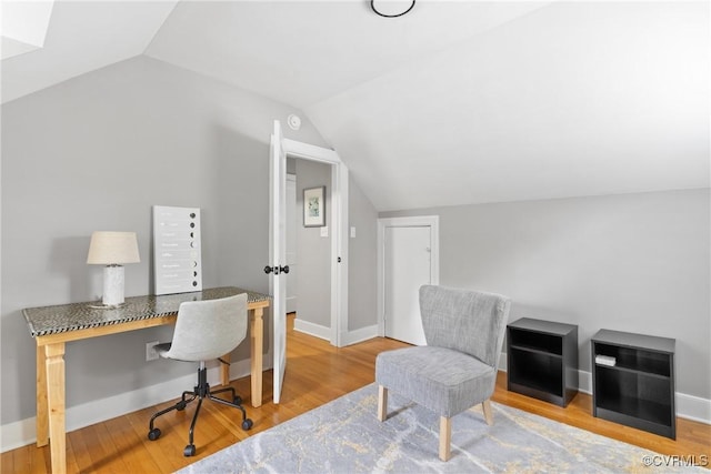 1012 Ridgecliff Dr, Richmond, VA 23224 - home office featuring lofted ceiling and wood finished floors