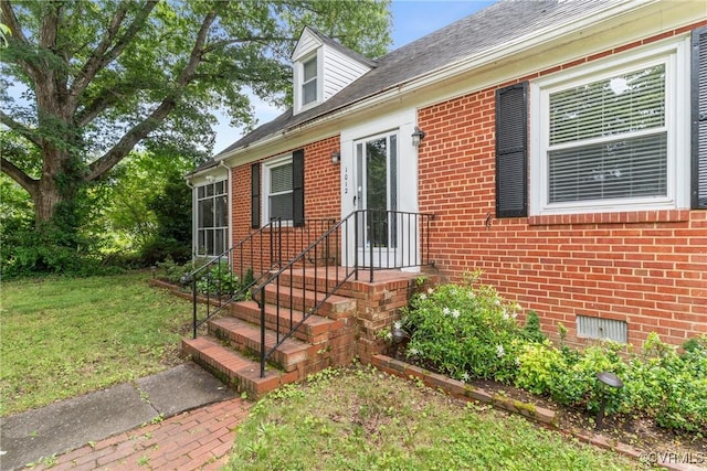 1012 Ridgecliff Dr, Richmond, VA 23224 - doorway to property featuring brick siding and a lawn