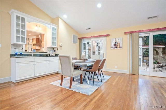 2821 Newquay Ln, North Chesterfield, VA 23236 - dining space with vaulted ceiling, light wood-style floors, healthy amount of natural light, and recessed lighting
