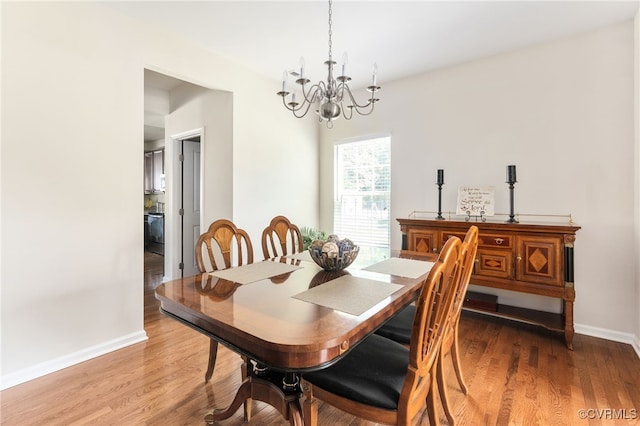11012 Wingstem Ct, Glen Allen, VA 23060 - dining room with a chandelier and wood finished floors