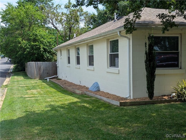 186 Piedmont Ave, Colonial Heights, VA 23834 - view of side of property featuring roof with shingles and concrete block siding