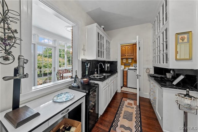 16520 Church St, Amelia Courthouse, VA 23002 - kitchen featuring dark countertops, white cabinets, glass insert cabinets, dark wood-style flooring, and wine cooler