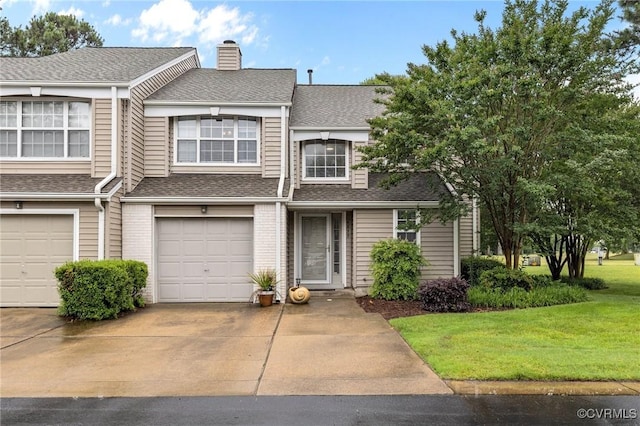 4855 Cypress Point Cir Unit 104, Virginia Beach, VA 23455 - townhome / multi-family property with a chimney, a front lawn, driveway, and roof with shingles