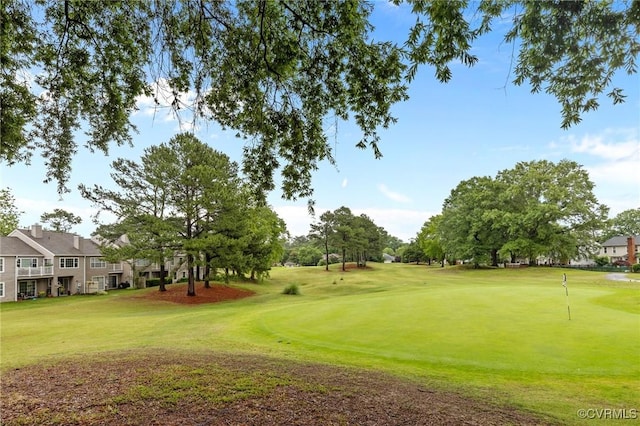 4855 Cypress Point Cir Unit 104, Virginia Beach, VA 23455 - view of community featuring a putting green, view of golf course, and a yard