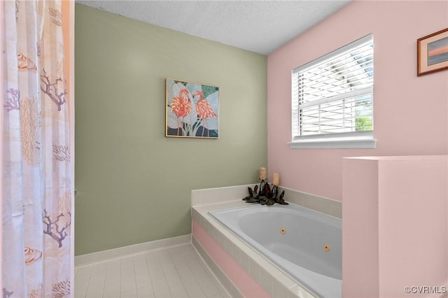 4855 Cypress Point Cir Unit 104, Virginia Beach, VA 23455 - full bath with a whirlpool tub, tile patterned floors, and a textured ceiling