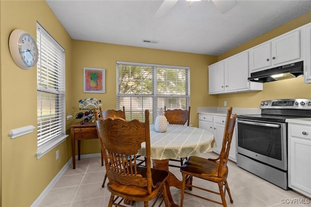 4855 Cypress Point Cir Unit 104, Virginia Beach, VA 23455 - dining area with light tile patterned flooring and ceiling fan