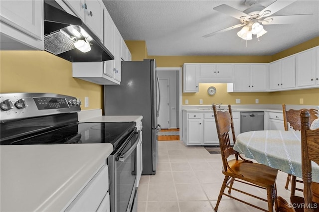 4855 Cypress Point Cir Unit 104, Virginia Beach, VA 23455 - kitchen featuring appliances with stainless steel finishes, under cabinet range hood, and white cabinets