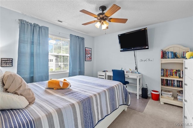 4855 Cypress Point Cir Unit 104, Virginia Beach, VA 23455 - carpeted bedroom featuring a textured ceiling and a ceiling fan