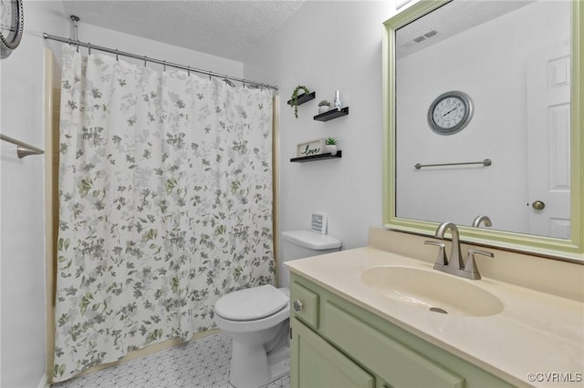 4855 Cypress Point Cir Unit 104, Virginia Beach, VA 23455 - bathroom featuring vanity, a textured ceiling, and a shower with shower curtain