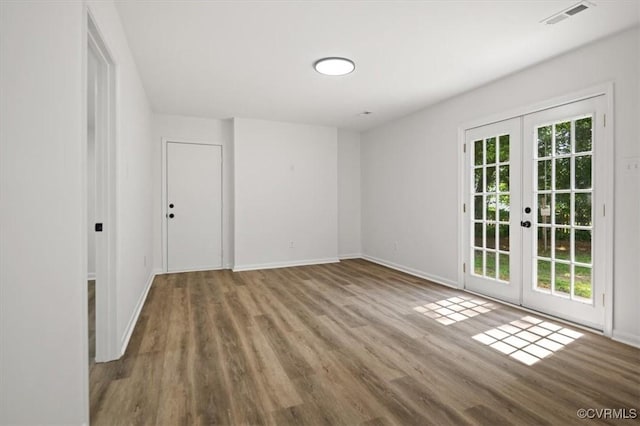419 Marblethorpe Rd, North Chesterfield, VA 23236 - unfurnished room with french doors and wood finished floors
