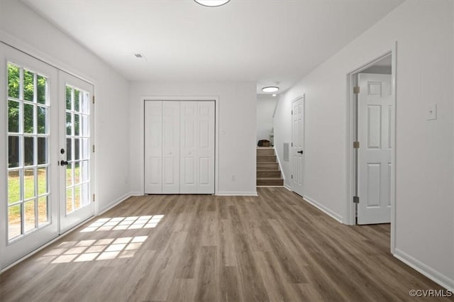 419 Marblethorpe Rd, North Chesterfield, VA 23236 - unfurnished bedroom featuring french doors, wood finished floors, access to exterior, and a closet