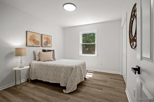 419 Marblethorpe Rd, North Chesterfield, VA 23236 - bedroom featuring baseboards and dark wood-type flooring