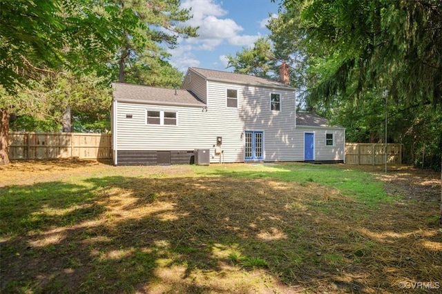 419 Marblethorpe Rd, North Chesterfield, VA 23236 - back of house featuring a chimney, a fenced backyard, and roof with shingles