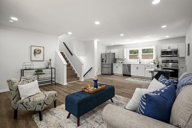 419 Marblethorpe Rd, North Chesterfield, VA 23236 - living room with stairs, light wood-style floors, and recessed lighting