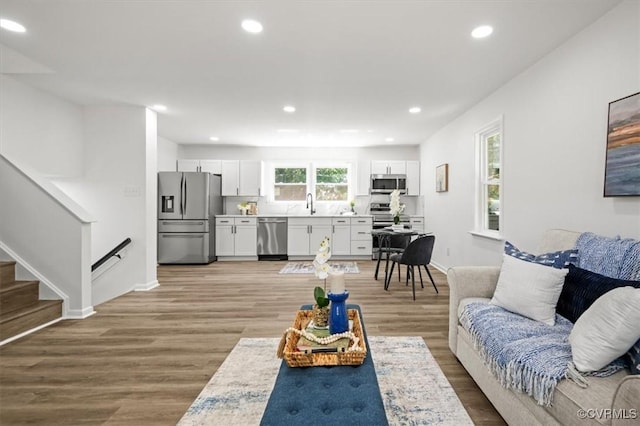 419 Marblethorpe Rd, North Chesterfield, VA 23236 - living area with light wood-type flooring, recessed lighting, and stairway