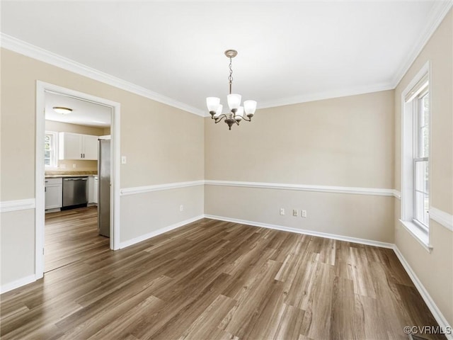 12213 Collinstone Pl, Glen Allen, VA 23059 - empty room featuring a chandelier, wood finished floors, and crown molding