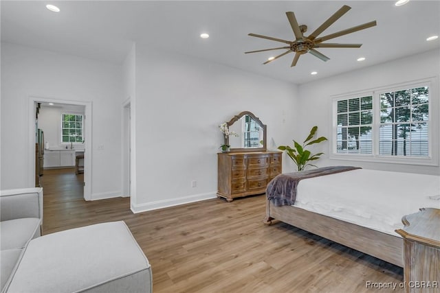 3315 Windmill Point Rd, White Stone, VA 22578 - bedroom featuring wood finished floors, freestanding refrigerator, and recessed lighting