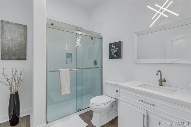 3315 Windmill Point Rd, White Stone, VA 22578 - full bathroom with wood finished floors, vanity, and a shower stall