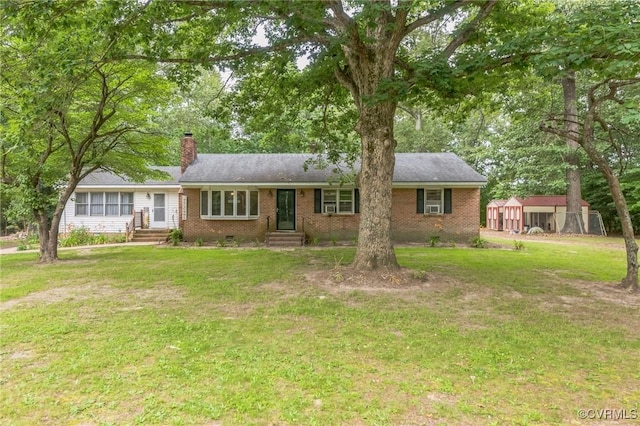 1305 Pea Ridge Rd, King & Queen, VA 23023 - ranch-style home featuring brick siding, a chimney, and a front lawn