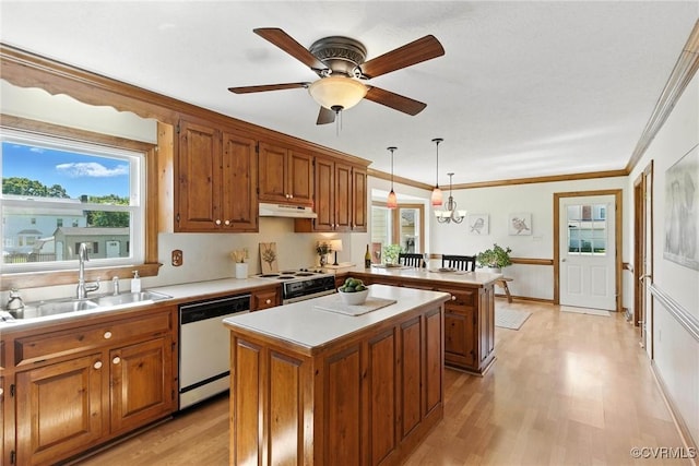 8346 Hanover Grove Blvd, Hanover, VA 23111 - kitchen with white dishwasher, a peninsula, under cabinet range hood, brown cabinets, and light countertops