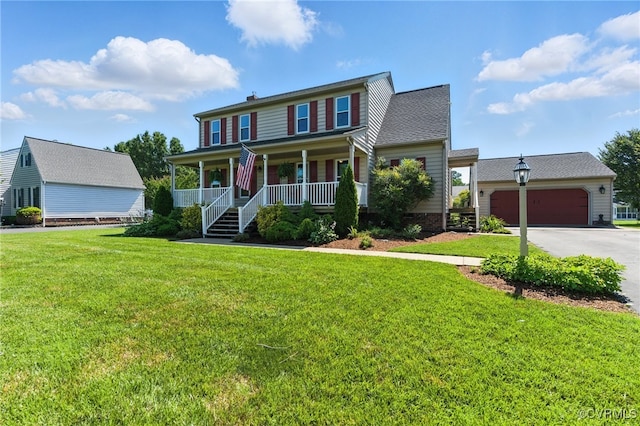 8346 Hanover Grove Blvd, Hanover, VA 23111 - view of front facade with covered porch, concrete driveway, a front yard, and an attached garage