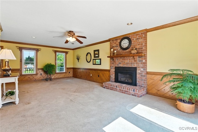 8346 Hanover Grove Blvd, Hanover, VA 23111 - living area featuring a wainscoted wall, wooden walls, carpet, ceiling fan, and a fireplace