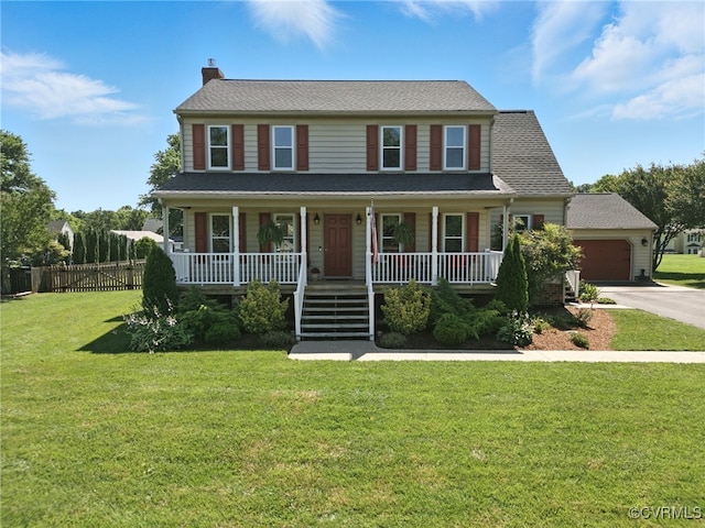 8346 Hanover Grove Blvd, Hanover, VA 23111 - colonial inspired home with an attached garage, a porch, driveway, a chimney, and roof with shingles