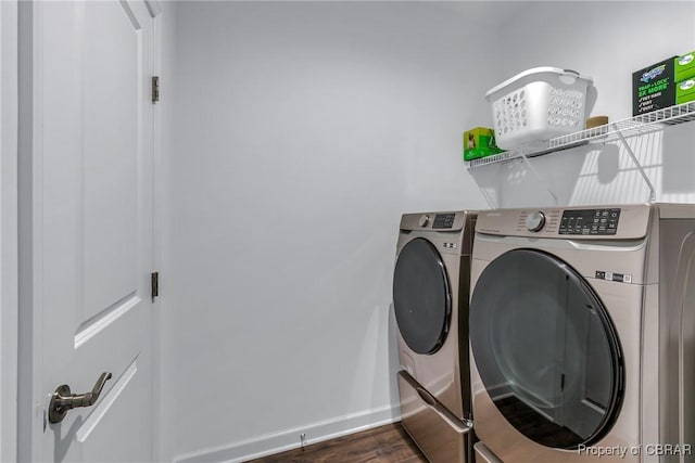 12 Essie Ct, Irvington, VA 22480 - laundry room with washer and clothes dryer and dark wood-style flooring