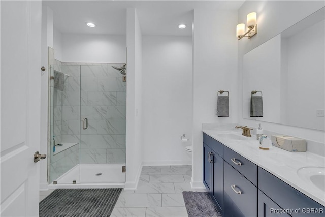 12 Essie Ct, Irvington, VA 22480 - bathroom featuring marble look tiles, double vanity, a stall shower, and recessed lighting