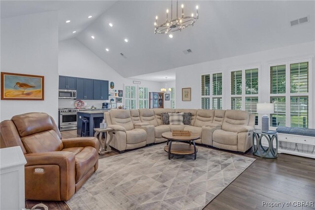 12 Essie Ct, Irvington, VA 22480 - living area featuring a chandelier, high vaulted ceiling, recessed lighting, and light wood finished floors