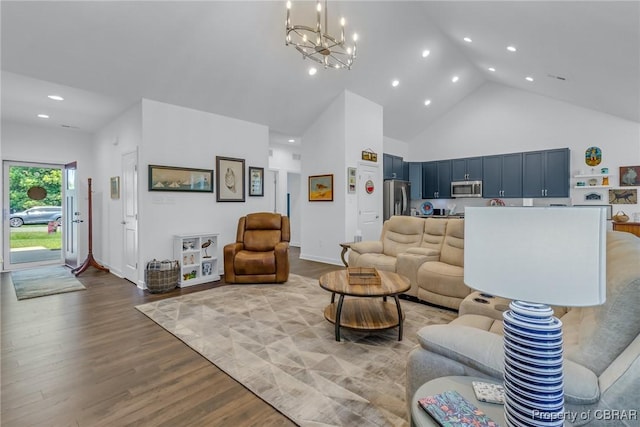 12 Essie Ct, Irvington, VA 22480 - living room with high vaulted ceiling, a chandelier, recessed lighting, and wood finished floors