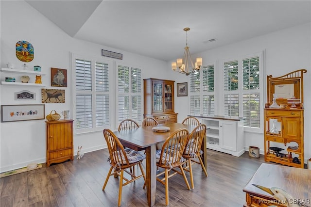 12 Essie Ct, Irvington, VA 22480 - dining room with a chandelier and dark wood-type flooring