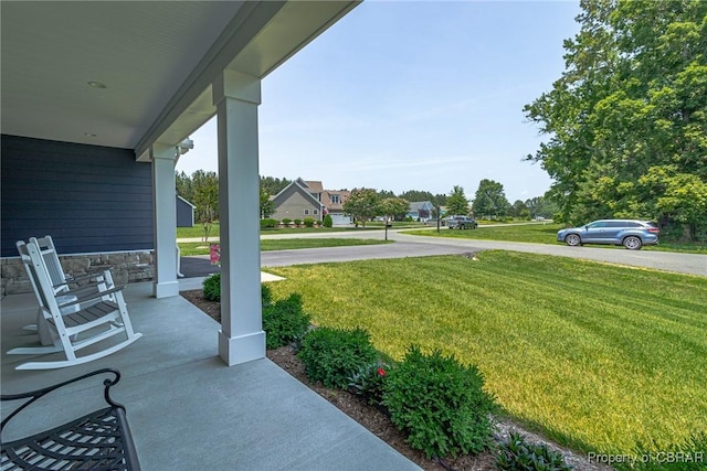 12 Essie Ct, Irvington, VA 22480 - view of grassy yard featuring a porch