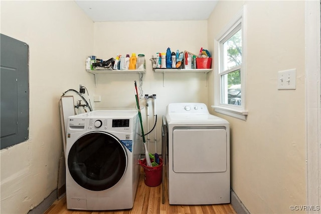 104 N Beech Ave, Henrico, VA 23075 - washroom with washing machine and clothes dryer, light wood-style floors, and electric panel