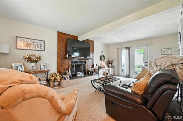 4901 Green Run Dr, Henrico, VA 23228 - living area with carpet, a fireplace with raised hearth, and a textured ceiling